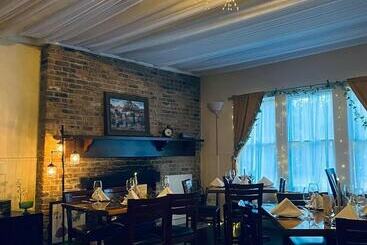 مبيت وإفطار Hodge Podge Lodge