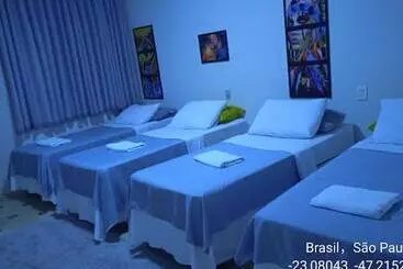 ペンション Acomodações Anfitriã
