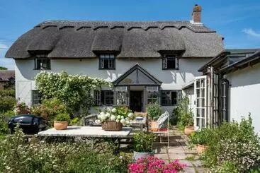ツーリストアパートメント Thatched Hat Cottage