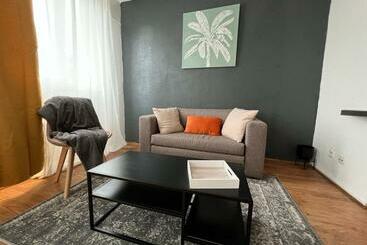 Apartamente turistice Mon Palmier Grand Appartement Parking Un Séjour à Part