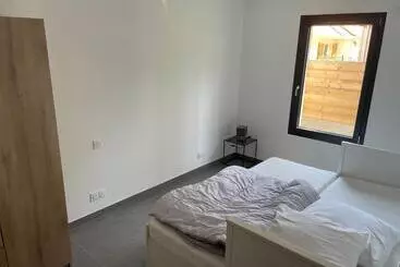 ツーリストアパートメント Maison Moderne Avec Piscine Chauffée