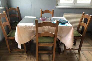 ペンション Maison D’hôtes Au Pied Du Château