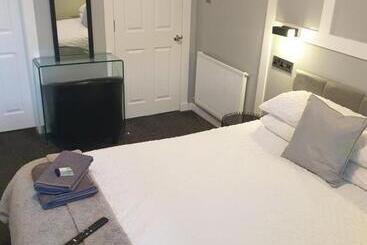 פנסיון The Coastal Inn Outbuilding