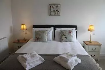 호텔 Three Horseshoes Country Inn