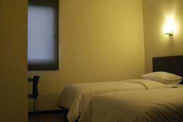 Отель Alpha Inn