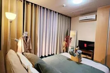 Aparthotel Modern Comforts 1br Urban Getaway In Bgc