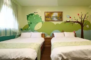 Hotell 陽光綠堤民宿