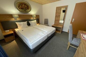 Отель Pension Am Brunnen