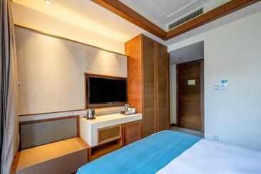 בית מלון כפרי Hnti·narada Sanya Bay Resort