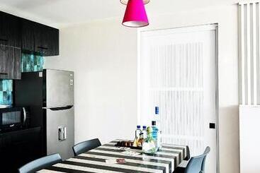 Отель Grant S Studio At Mantamar Tower