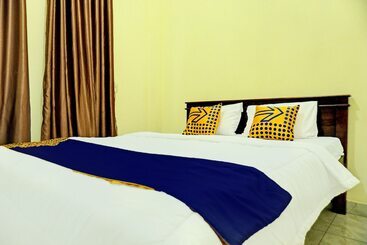 Отель Spot On 92392 Penginapan Vinccent22 Syariah