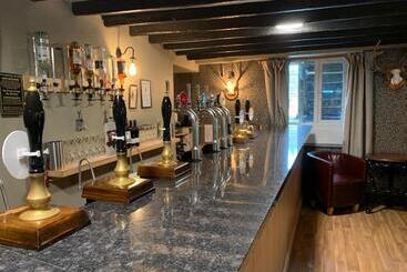 צימר The Black Dog Inn