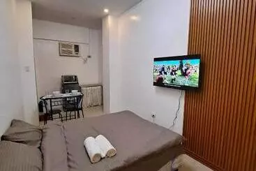 Aparthotel Caishen Apartelle The Couples Getaway