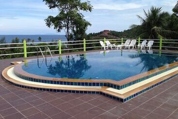 بنسيون J.b. Hut Bungalows