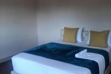 ペンション Tripple S Guest House