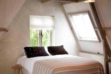 تختخواب و صبحانه In De Aap   Appartementen & Guesthouse