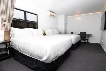 モーテル The Haven Newmarket Suites