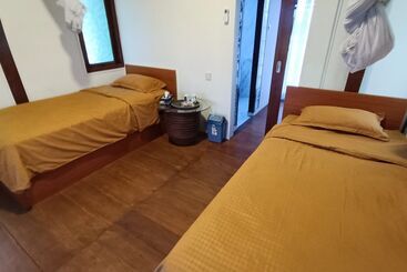 Hotel Spot On 94076 Tinampi House Syariah