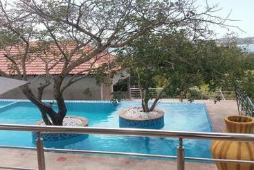 אתר נופש Ossanzaia Bilene Lodge