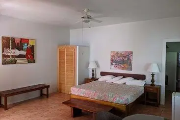 Case con Giardino La Sagesse Boutique Hotel, Restaurant and Beach Bar