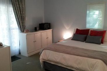 דירה Woodlands Retreat