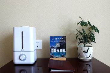 호텔 Ramada Encore Daochengyading