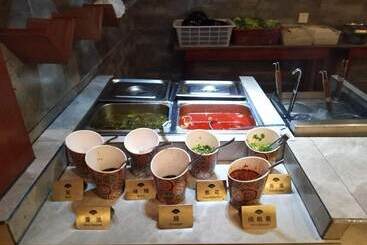 Hotel Ramada Encore Daochengyading