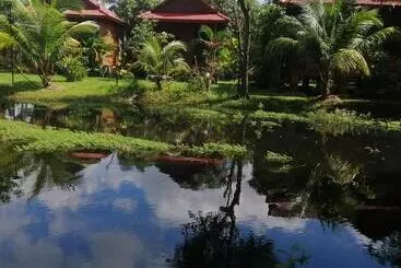 Pensiune The Hidden Oasis Bungalows