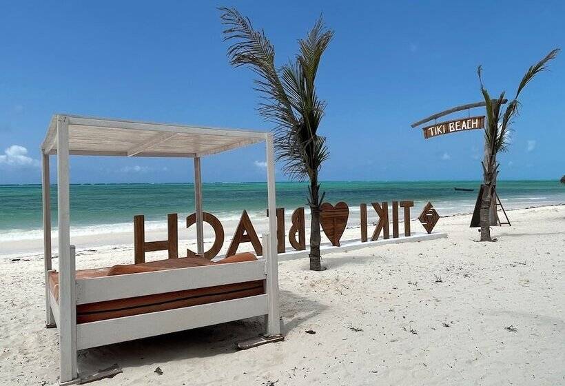 בית מלון כפרי Tiki Beach Club And Resort