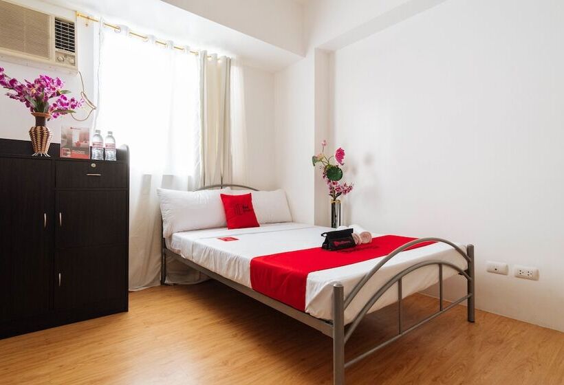 Отель Reddoorz @ Amaia Skies Avenida