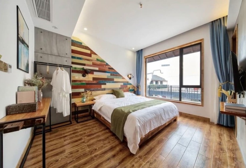 Qinmeng Wuzhen Lao Mu's Home Inn