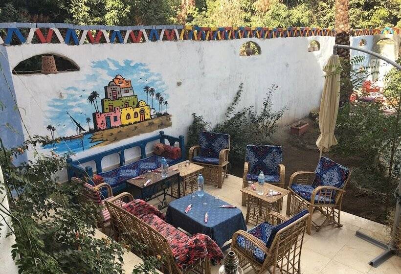 تختخواب و صبحانه The Mango Guest House