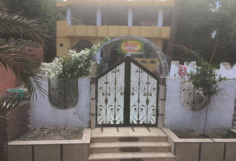 تختخواب و صبحانه The Mango Guest House