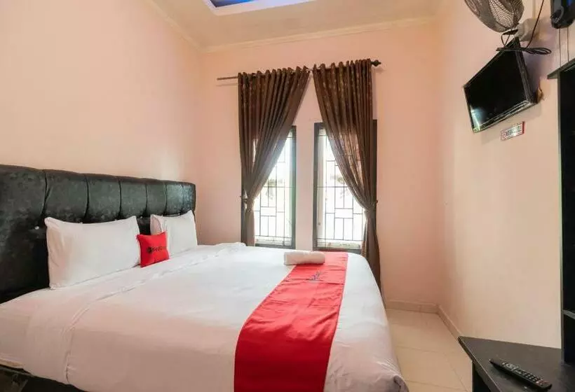 ホテル Reddoorz Syariah At D Ostha Residence