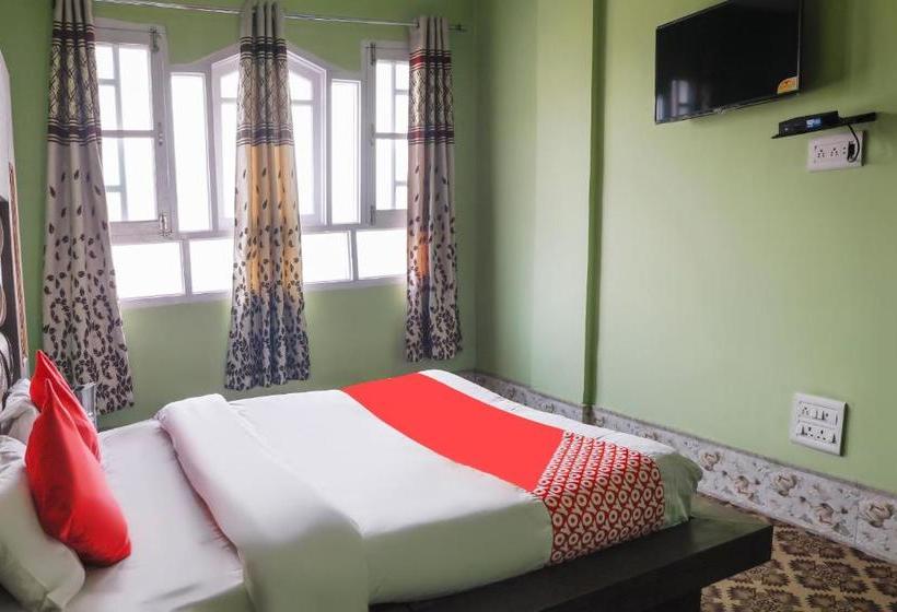 Отель Capital O Sobo Central