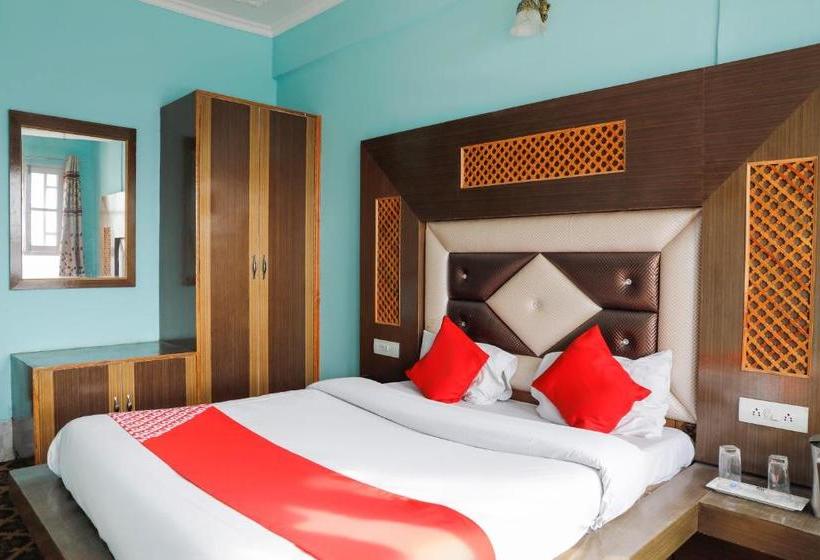 Отель Capital O Sobo Central