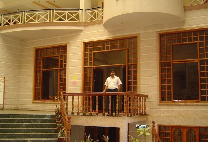 فندق Amogha International