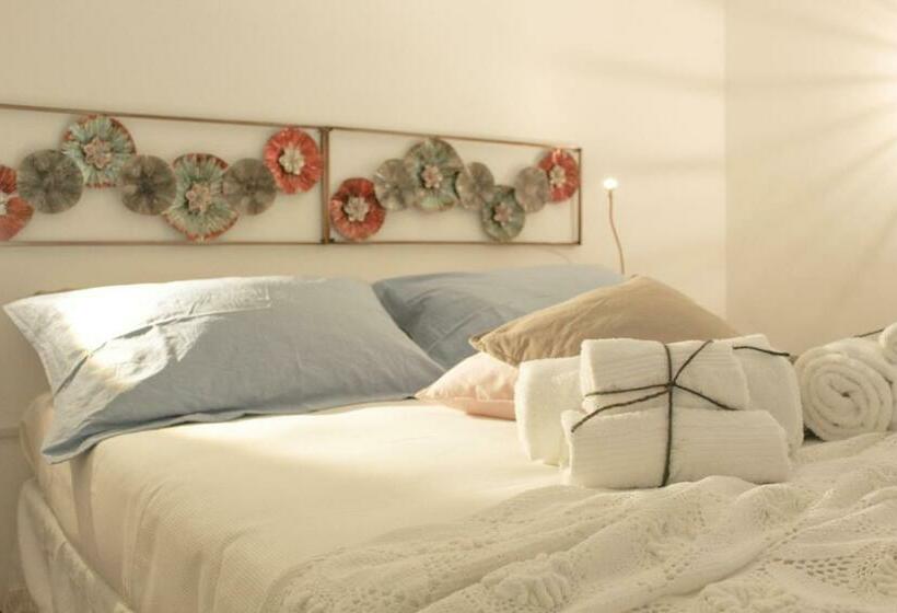 تختخواب و صبحانه Li Suluri