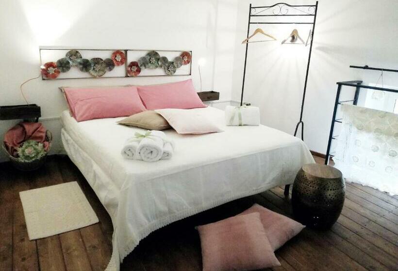 تختخواب و صبحانه Li Suluri