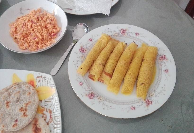 פנסיון Mango Roots