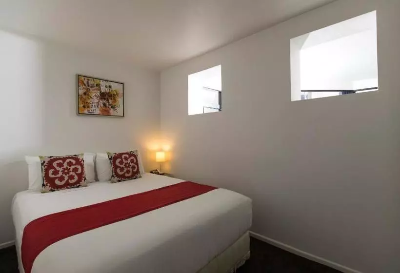 Отель Quest On The Terrace Serviced Apartments