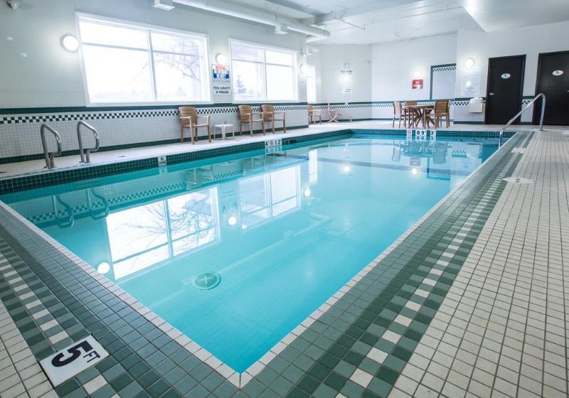 Merit Hotel & Suites