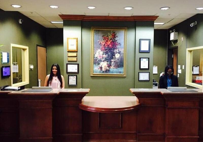 Merit Hotel & Suites