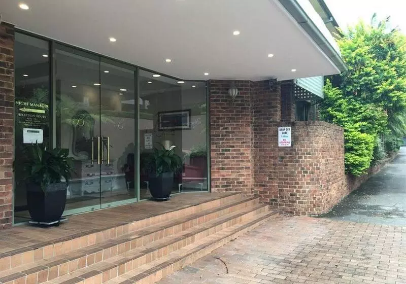 Отель The Belmore Apartments