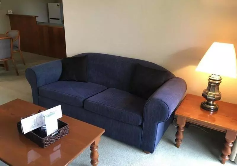 Отель The Belmore Apartments