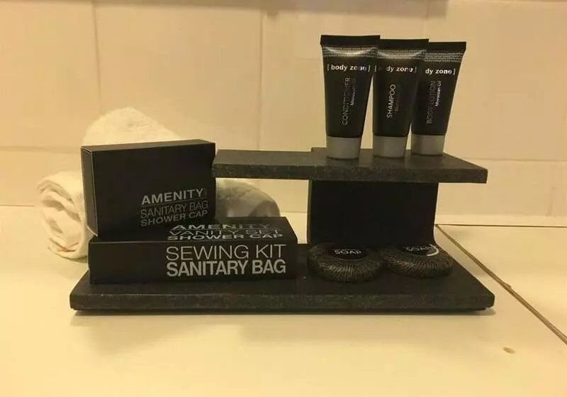 Отель The Belmore Apartments