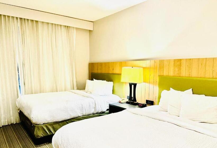 호텔 Radiant Inn And Suites