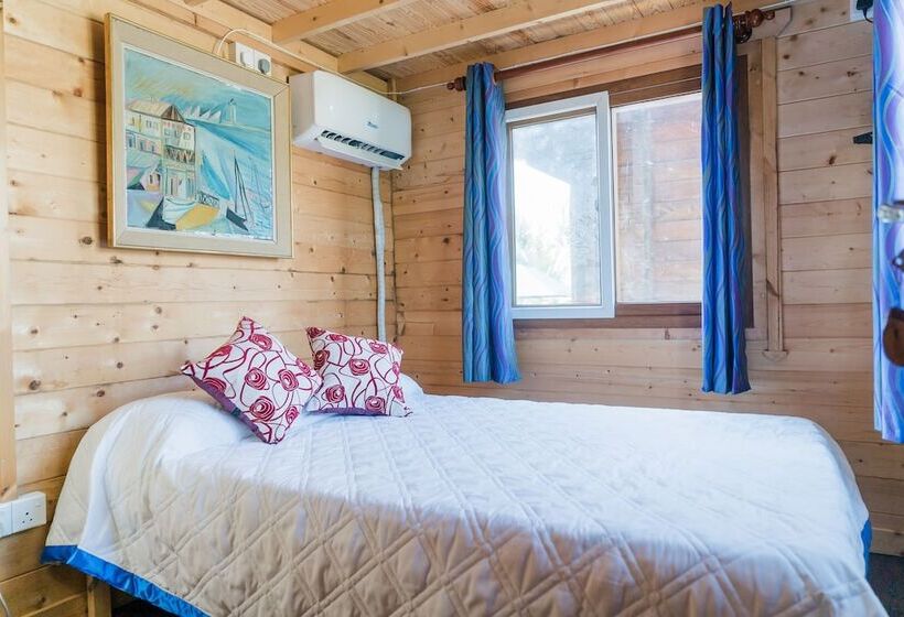 فندق Les Beach Chalets