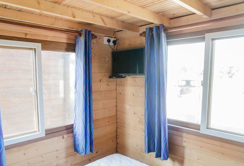 فندق Les Beach Chalets