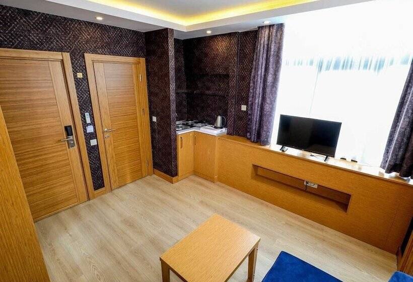 Отель Grand Elmira Suites